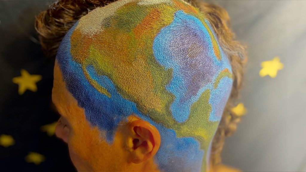 Aaron with a painted head